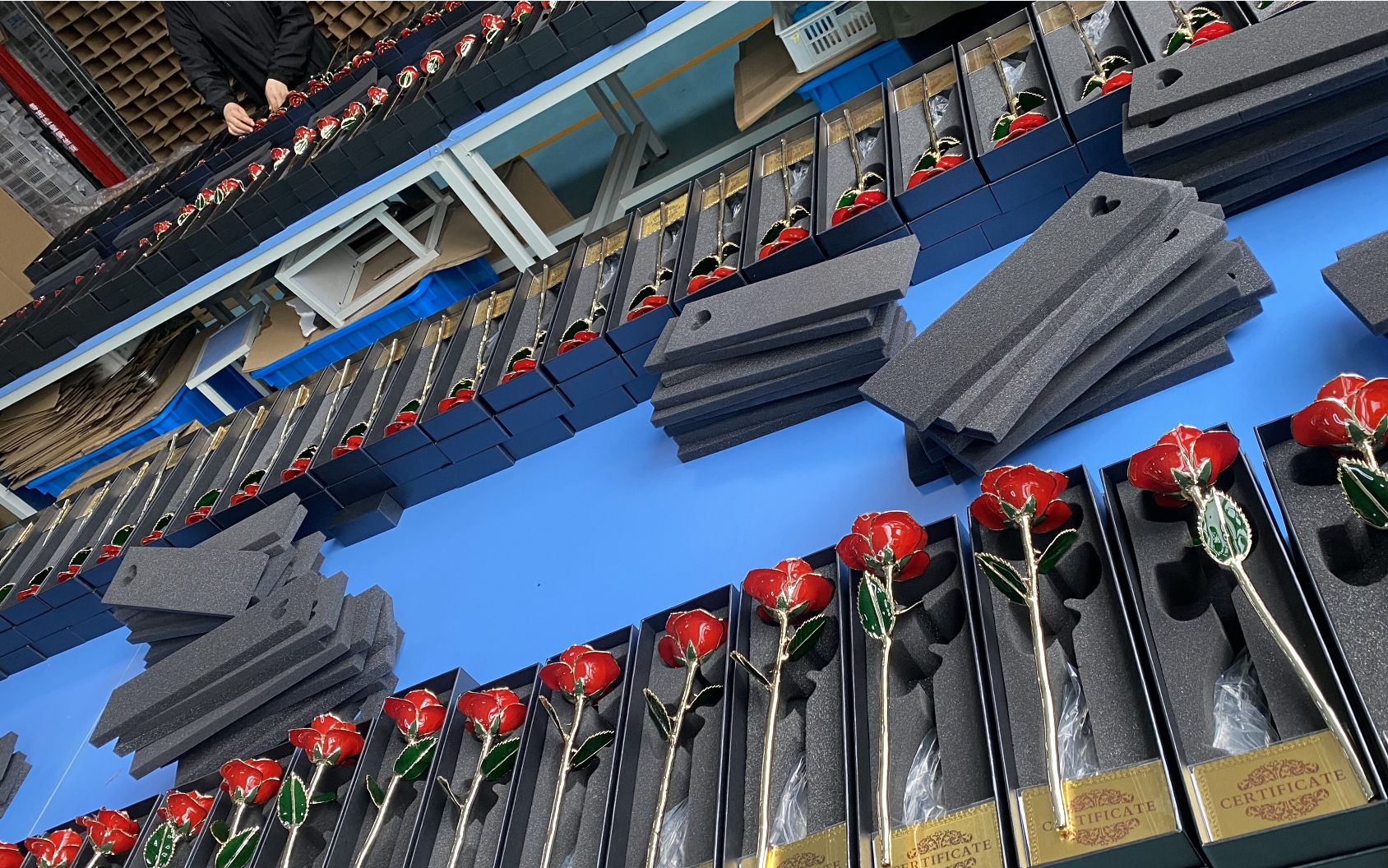 Workers producing natural 24K gold dipped roses in China
